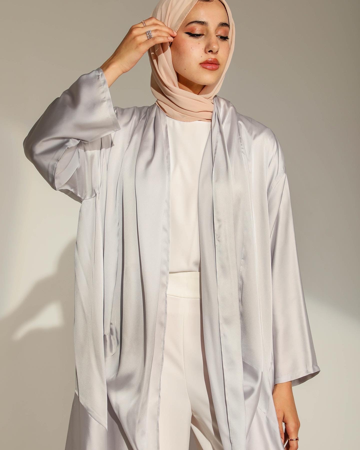 DRAPED ABSTRACT CARDIGAN IN SILVER