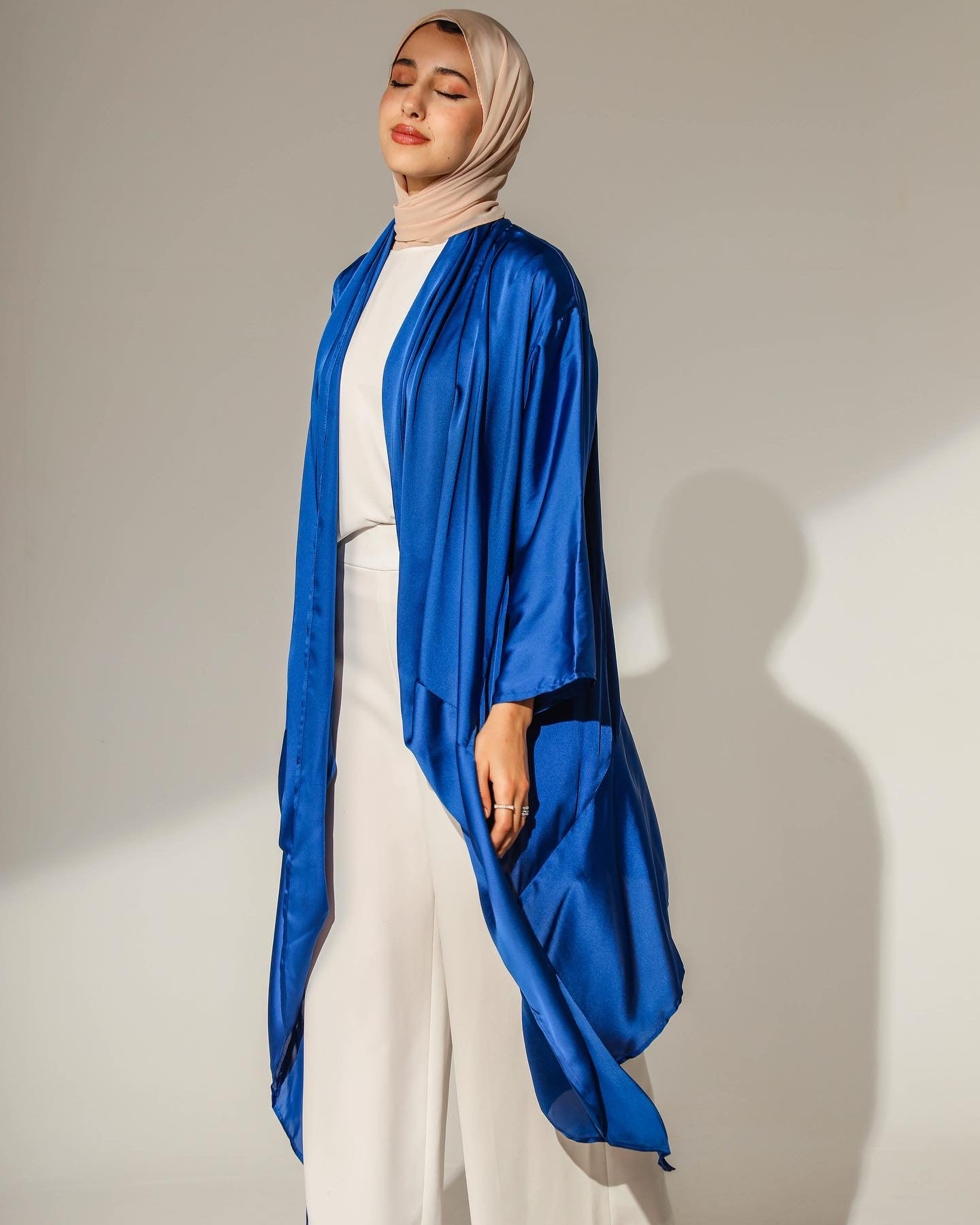 DRAPED ABSTRACT CARDIGAN IN ROYAL BLUE