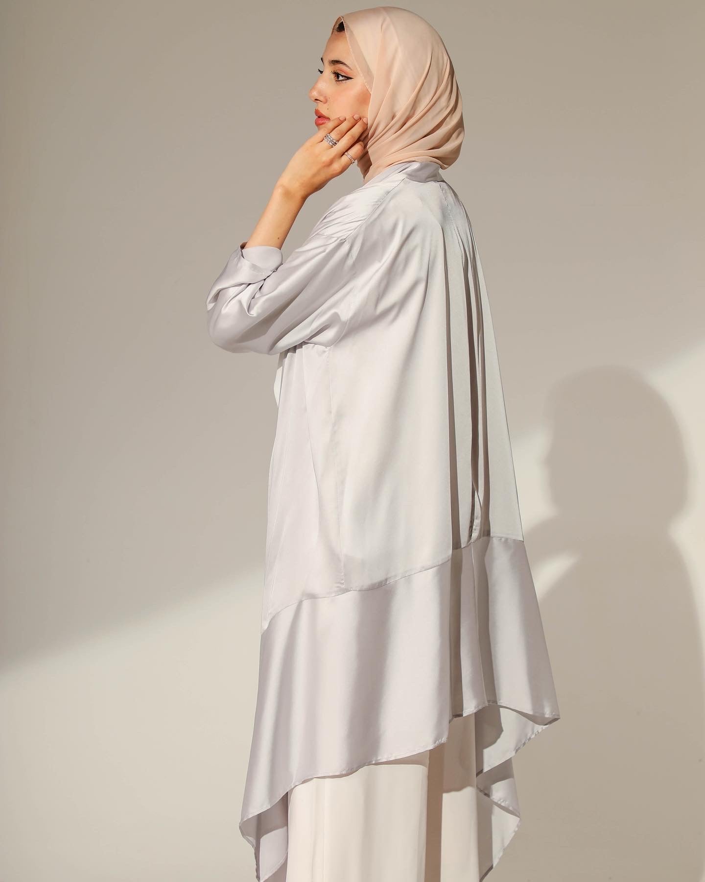 DRAPED ABSTRACT CARDIGAN IN SILVER